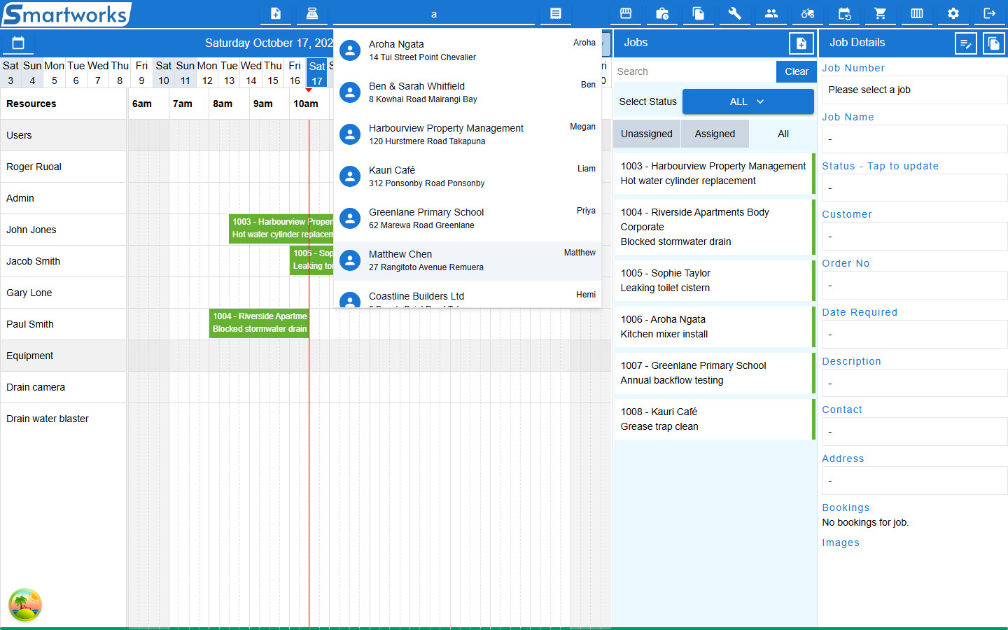 The header search box with a list of matching customers and jobs below it